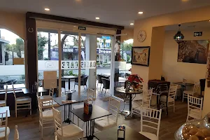 The Oasis cafe restaurante image