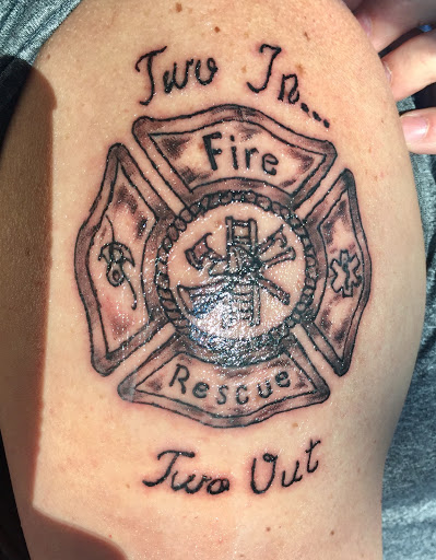 Explore tattoo ideas for photographers, creative tattoo ideas in Pigeon Forge, available at American Rebel Tattoo Studio