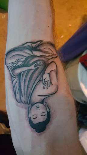 Explore lower arm tattoos ideas for guys, creative tattoo ideas in Chicago, available at THE TAT CAVE