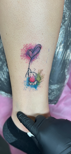 Explore flowers for tattoo ideas, creative tattoo ideas in New Carlisle, available at Reckless Temptations