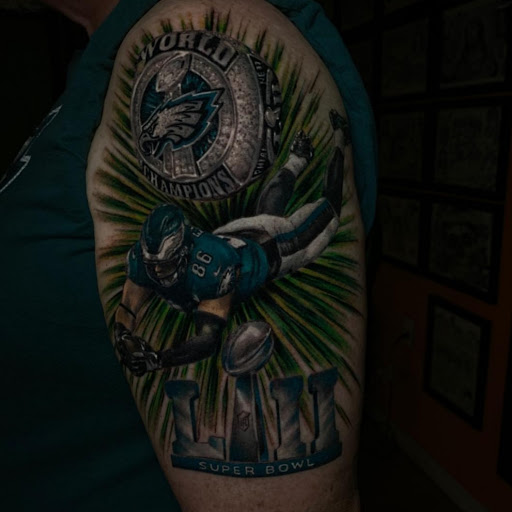 Explore wine glass tattoo ideas, creative tattoo ideas in Ambler, available at Tattoo GalaxyAmbler Piercing & Custom Tattoos