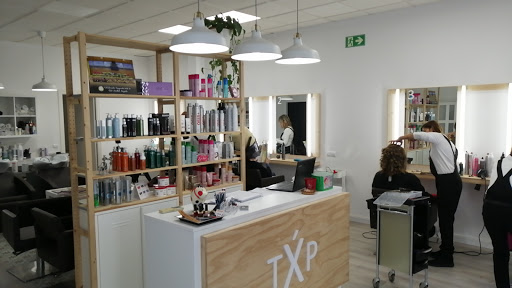 Txús Perruqueria en Amposta, Tarragona