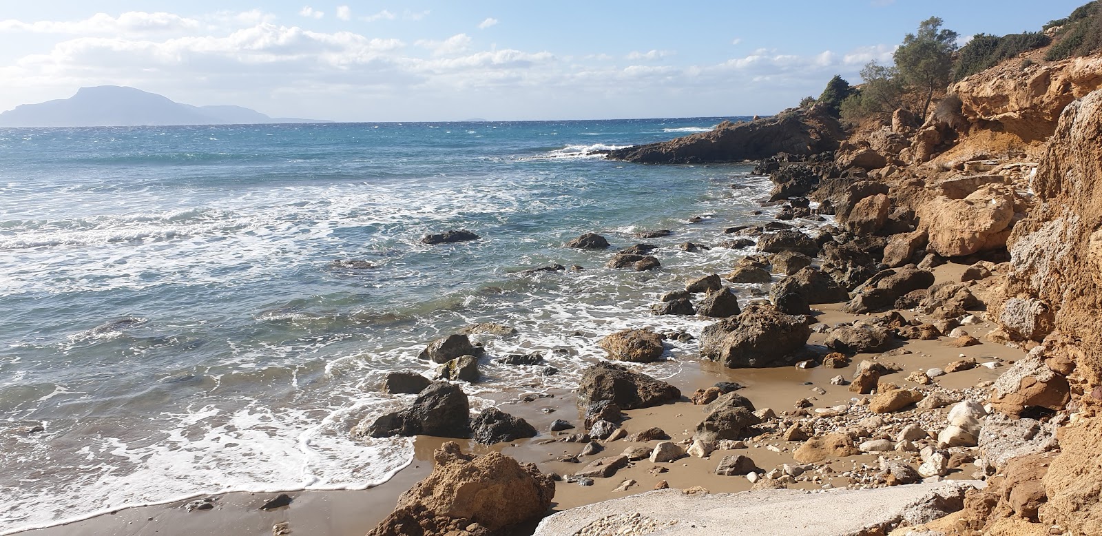 Foto van Agios Georgios beach met hoog niveau van netheid