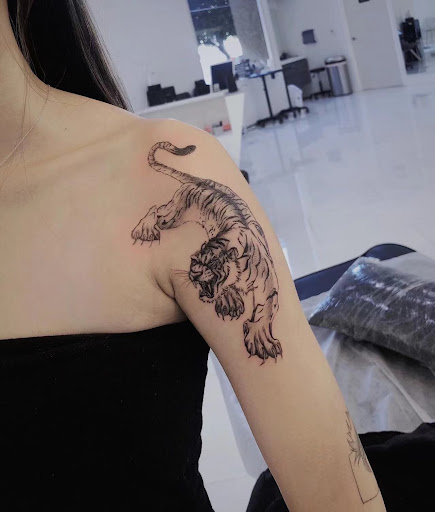 Explore tattoo ideas for men on forearm, creative tattoo ideas in Orange, available at Baron Art Tattoo