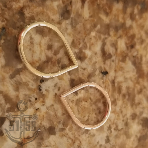 Explore cash tattoo ideas, creative tattoo ideas in Kearney, available at Studio 5150 Piercing & Fine Jewelry