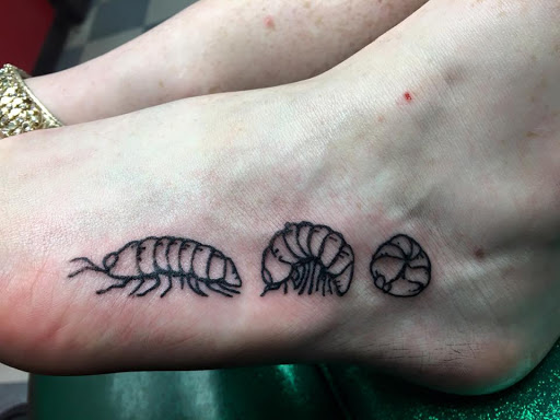 Explore black mamba tattoo ideas, creative tattoo ideas in Emporia, available at Mauds Tattoo Company