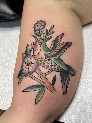 Explore women back tattoo ideas, creative tattoo ideas in Elkin, available at Black Bear Tattoo