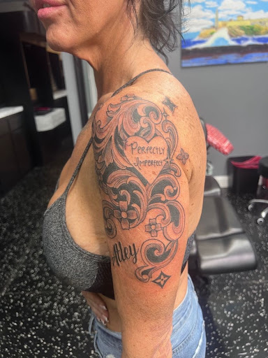 Explore car guy tattoo ideas, creative tattoo ideas in Fort Myers, available at Loyal 2 The Coil Tattoos & Piercings (Edison Mall Location Entrance F)