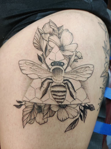 Explore tattoo cuff ideas, creative tattoo ideas in Tahlequah, available at Monochrome Ink