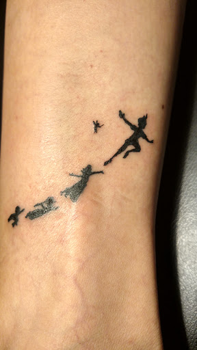 Explore ring tattoo cover up ideas, creative tattoo ideas in Fuquay Varina, available at 401 Tattoo and Antiquities