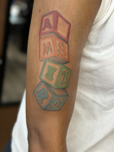 Explore happiness tattoo ideas, creative tattoo ideas in Rochester, available at Forest Ink Tattoos