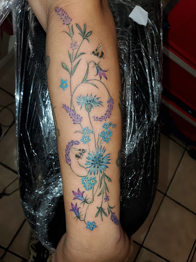 Explore butterfly tattoo ideas for females, creative tattoo ideas in Tampa, available at Angel Tattoo