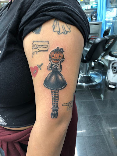 Explore bass tattoo ideas, creative tattoo ideas in Woodhaven, available at 94 Ink Tattoos