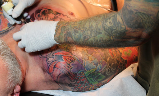 Explore new dad tattoo ideas, creative tattoo ideas in Boulder, available at Rising Tide Tattoo Emporium