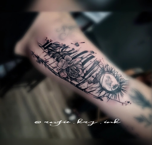 Explore music tattoo ideas male, creative tattoo ideas in Casper, available at Luna & Lotus Amethyst Ink Angie Kay