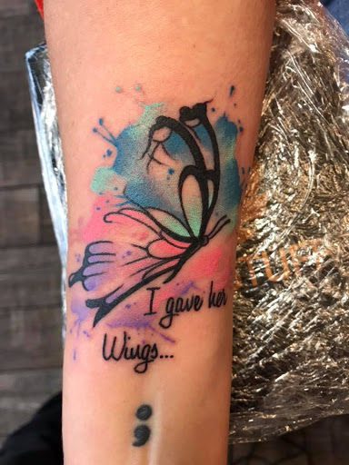 Explore tattoo ideas for a son, creative tattoo ideas in Lakeland, available at Black Swan Tattoo