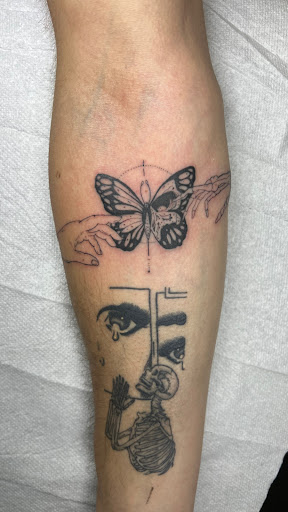 Explore back tattoo ideas for guys, creative tattoo ideas in Lakeville, available at Savage Ink