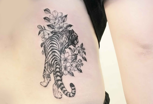 Explore sunflower and butterfly tattoo ideas, creative tattoo ideas in Sunnyvale, available at Greego tattoo