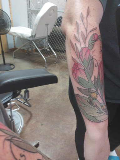 Explore tribal cross tattoo ideas, creative tattoo ideas in Wentzville, available at Jammer Joint Tattoo