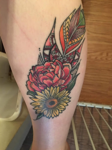 Explore traditional knee tattoo ideas, creative tattoo ideas in Yorktown, available at Army Navy Tattoo