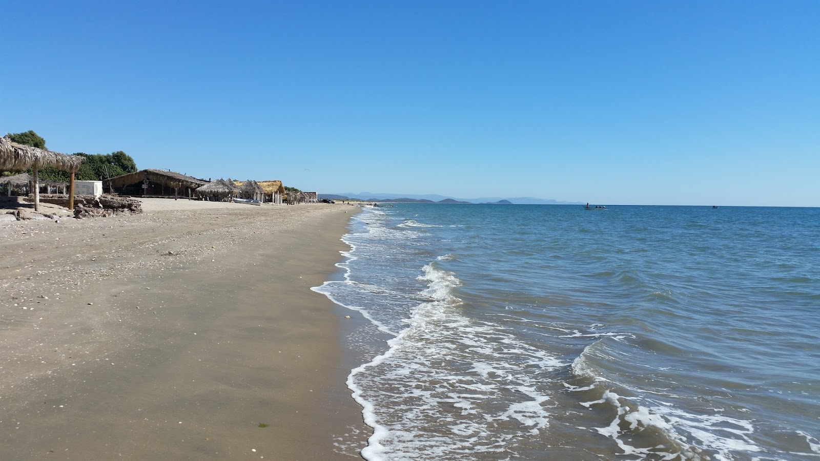 Zdjęcie El Cochorit beach z powierzchnią jasny piasek