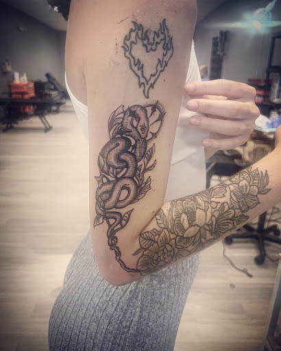 Explore love yourself tattoo ideas, creative tattoo ideas in Cocoa, available at Rorschach Tattoo Shop and Piercing Studio