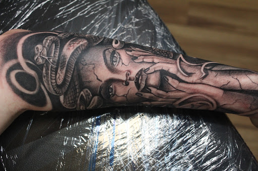 Explore machine tattoo ideas, creative tattoo ideas in Homosassa, available at Citrus Tattoos
