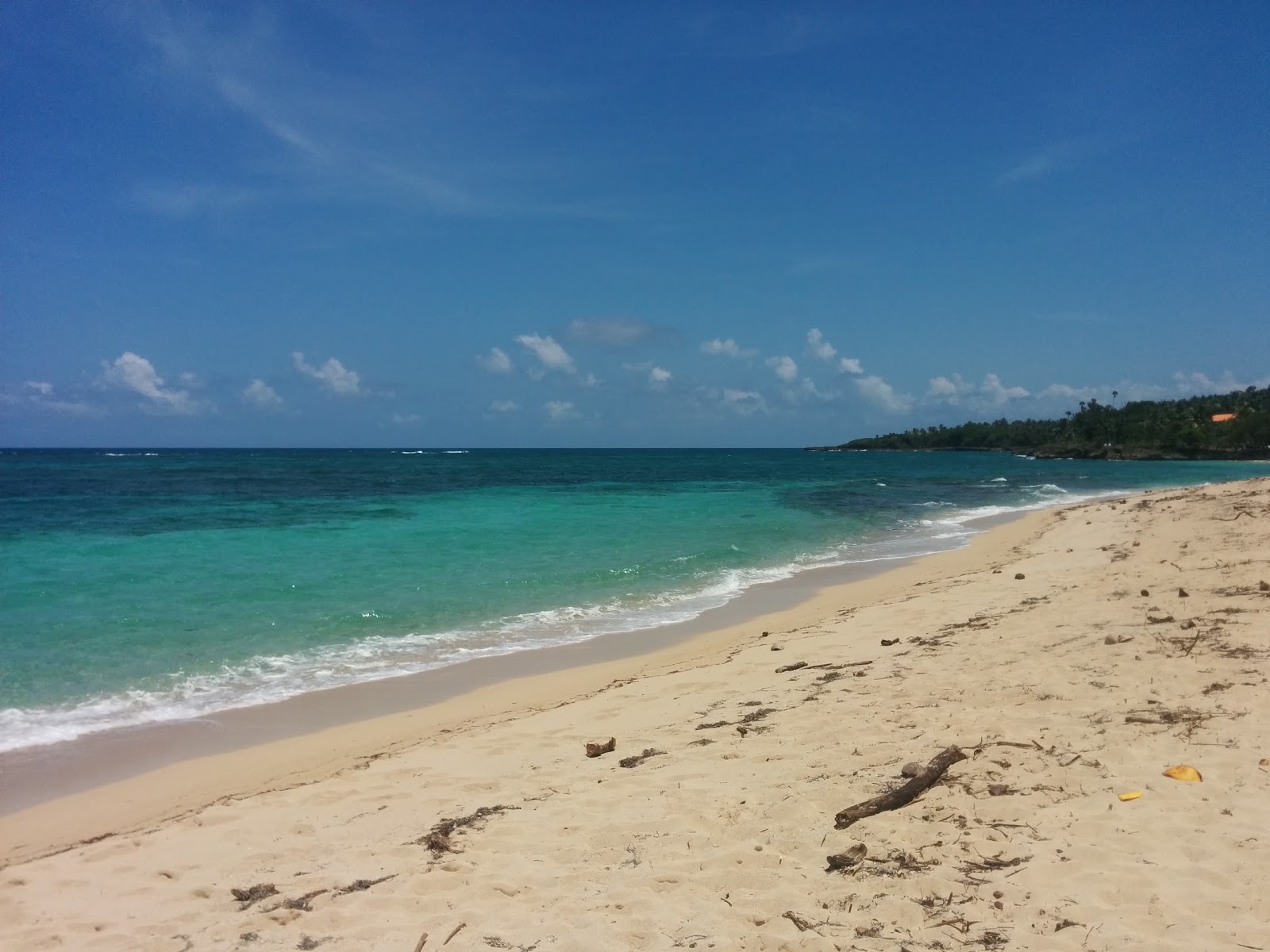 Foto de Playa de Nibujon con arena brillante superficie