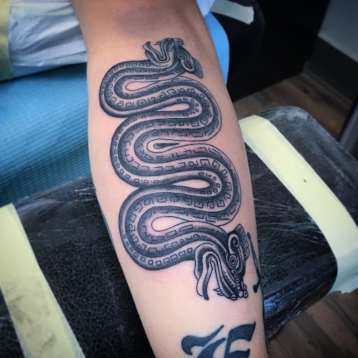 Explore wlw tattoo ideas, creative tattoo ideas in Madera, available at Sea Wolf Tattoo