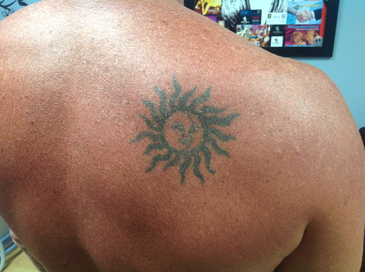 Explore superman tattoo ideas, creative tattoo ideas in Honolulu, available at Way Gone Laser Tattoo Removal