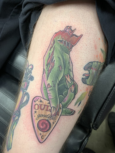 Explore hello kitty tattoo ideas, creative tattoo ideas in Federal Way, available at Jurassic Ink Tattoo Co.