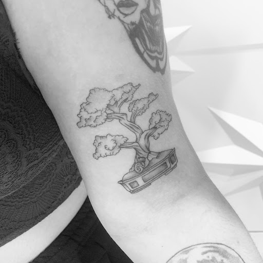 Explore police officer tattoo ideas, creative tattoo ideas in Fairfax, available at Pinky Inky Tattoo