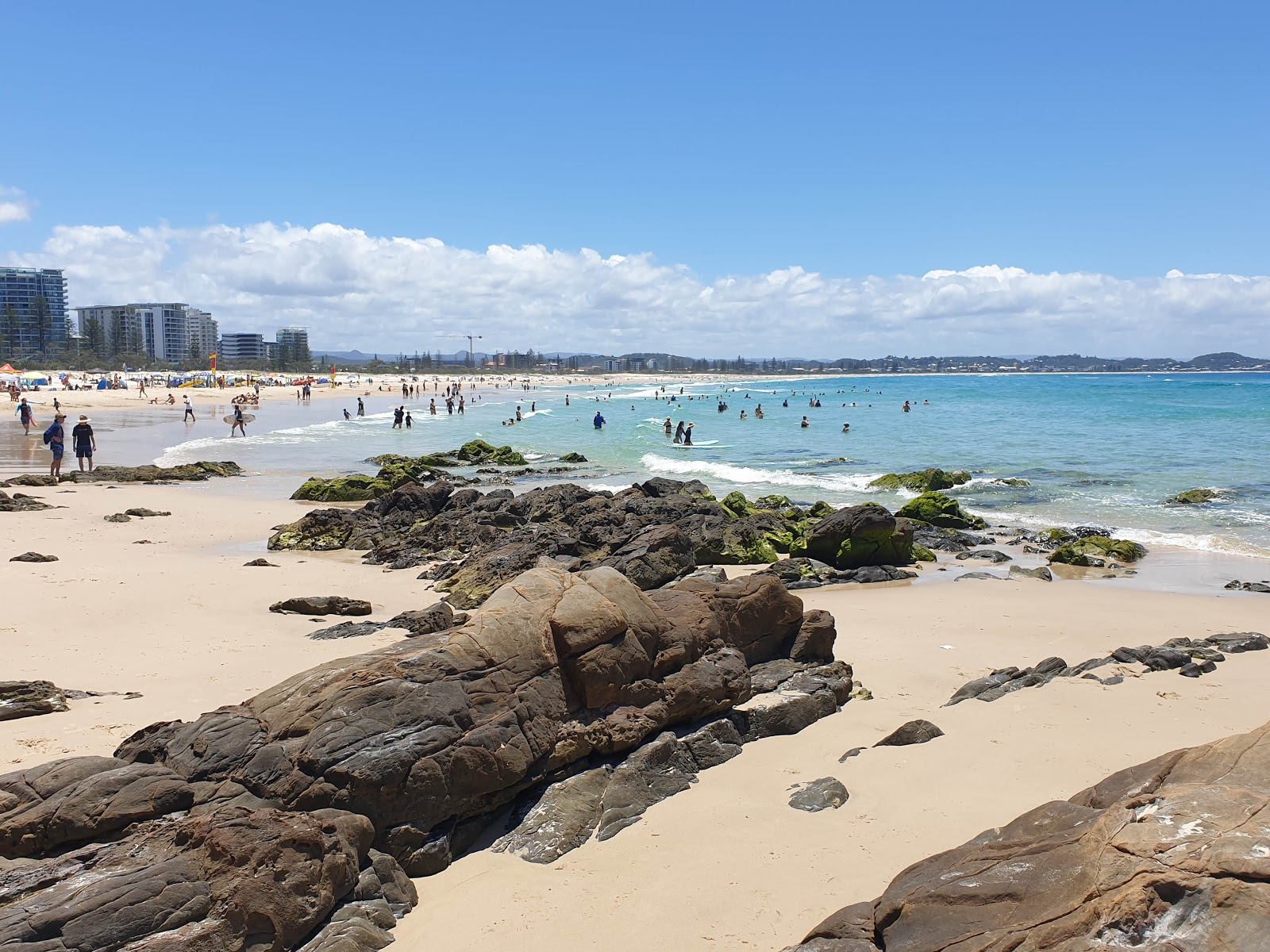 Photo of Kirra Beach with long straight shore
