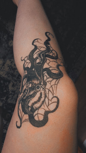 Explore dragon tattoo ideas for ladies, creative tattoo ideas in North Tonawanda, available at Dark Side Ink Tattoo Studio