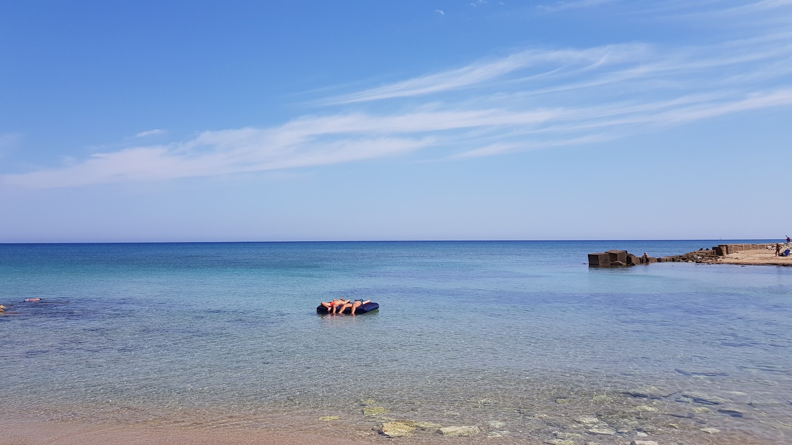 Fotografija Spiaggia di Sciaia z modra čista voda površino