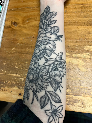 Explore quarter sleeve tattoo ideas for women, creative tattoo ideas in Seymour, available at Sacred Art Tattoo