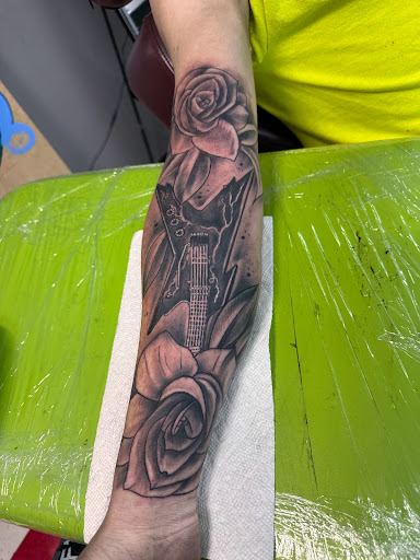 Explore deaf tattoo ideas, creative tattoo ideas in Noblesville, available at Mystic Images Tattoo Co.