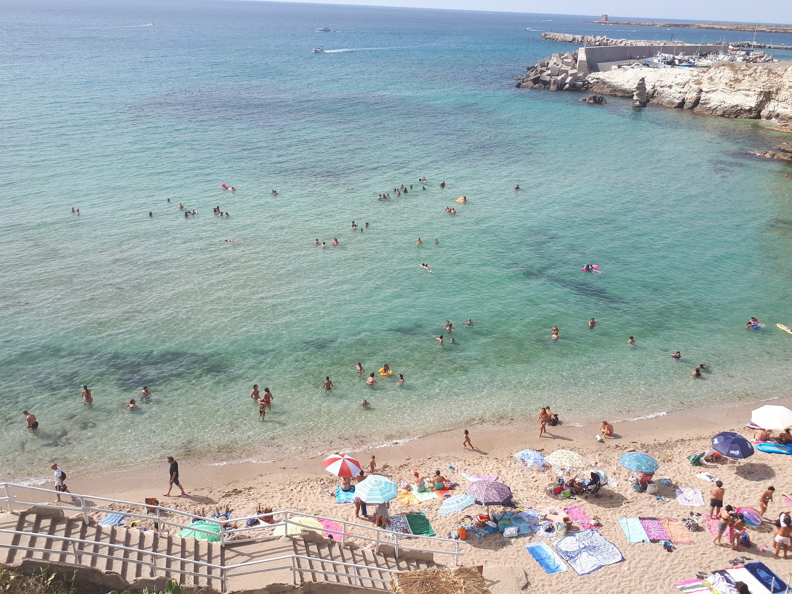 Photo of La Praiola beach with turquoise pure water surface