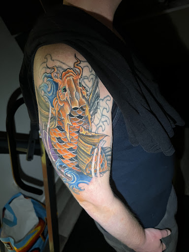 Explore good ideas for a cover up tattoo, creative tattoo ideas in Elyria, available at Distilled Ink Tattoo Parlor