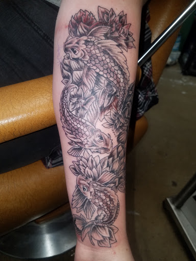 Explore god tattoo ideas for men, creative tattoo ideas in Odessa, available at Little Dragon Tattoos Studio