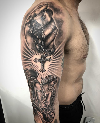 Explore lily of the valley tattoo ideas, creative tattoo ideas in Coral Springs, available at Salvation Tattoo Lounge Coral Springs