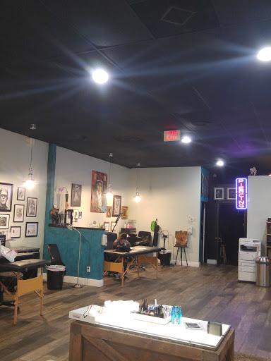 Explore barbed wire tattoo ideas, creative tattoo ideas in Kissimmee, available at Fallen Sparrow Tattoo Co