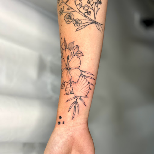 Explore outdoor tattoo sleeve ideas, creative tattoo ideas in Wilmington, available at Rogue Tattoo Studio