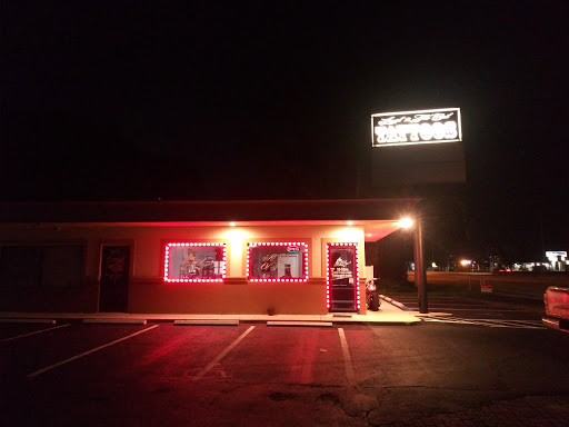 Explore thigh tattoo ideas woman, creative tattoo ideas in North Fort Myers, available at Loyal 2 The Coil Tattoos & Body Piercings