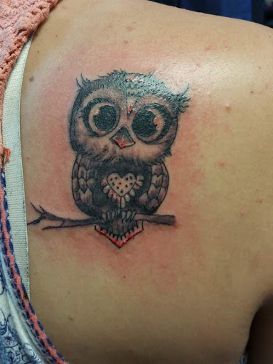 Explore butterfly tattoo ideas on arm, creative tattoo ideas in Elko, available at Tom Custom Tattoos and Body Piercing Studio