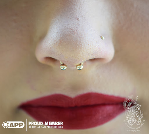 Explore tattoo ideas for belly button, creative tattoo ideas in Pompano Beach, available at Athena Body Adornment