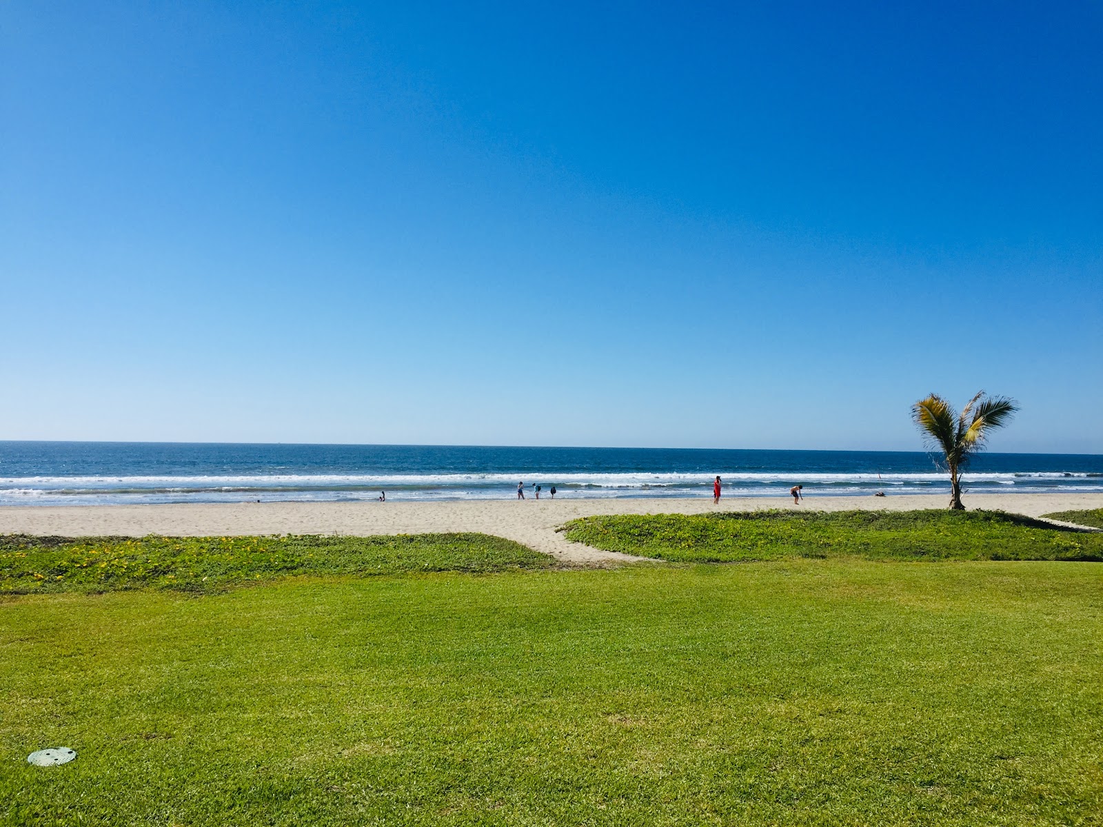 Isla de la Piedra beach II的照片 带有碧绿色水表面