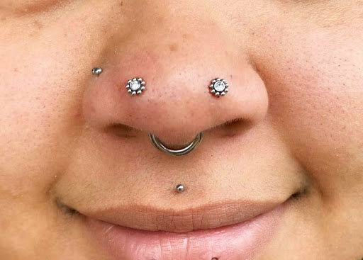 Find best small tattoo ideas for men for your next unique tattoo in Summerville at Exotic Impressions Body Piercing