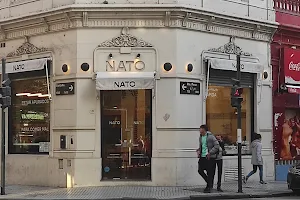 Nato Comé Real image