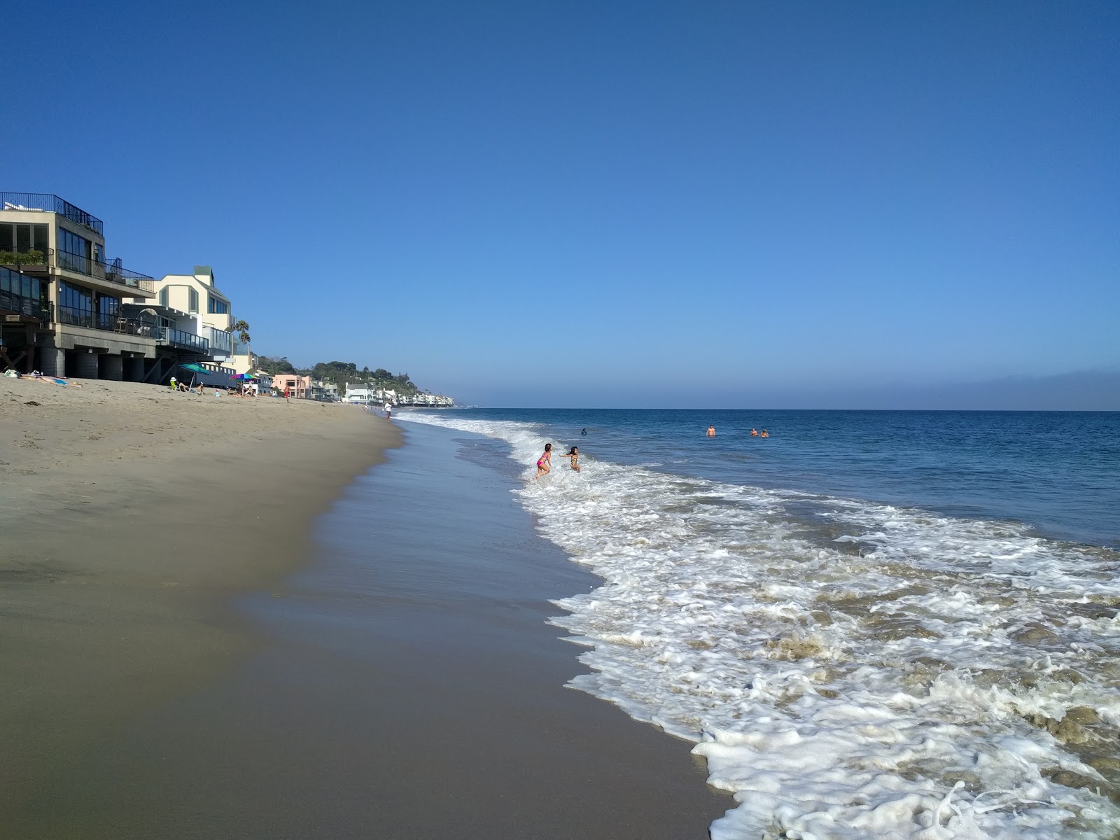 Photo of Escondido Beach with turquoise water surface